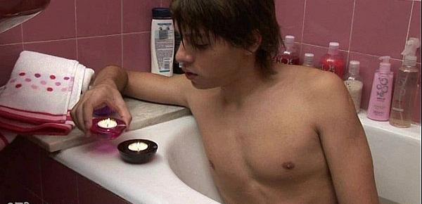  Nude boy waxing his cock and poking his wet behind